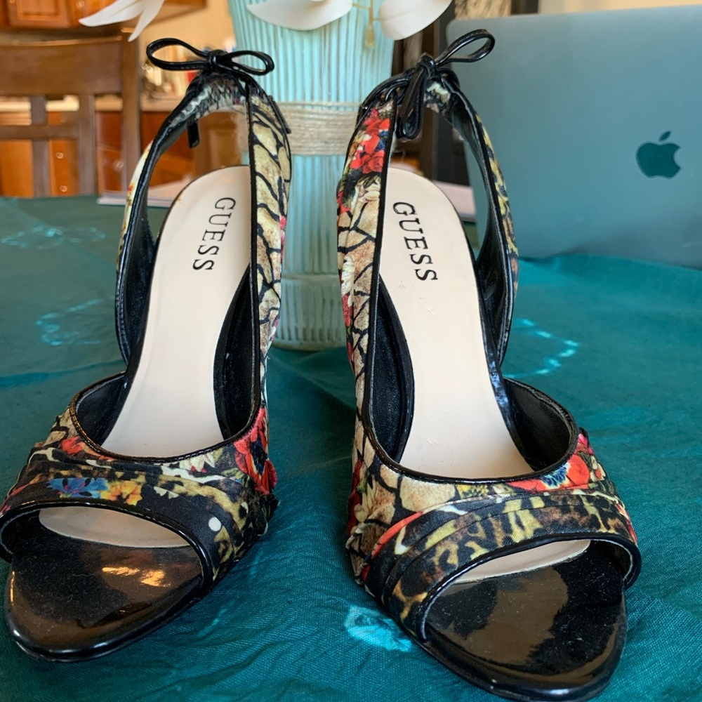Guess high heels like new, only worn once. Size 6 but RUNS SMALL.